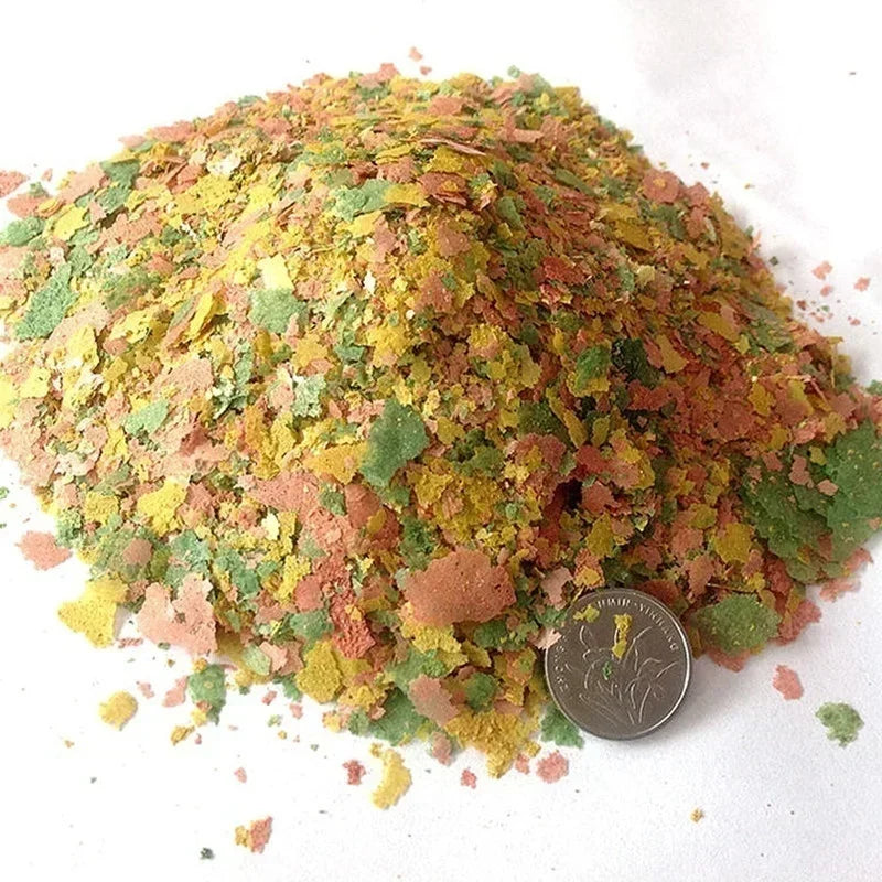 Alimento en Láminas Finas para Peces Tropicales Pequeños, 100 g