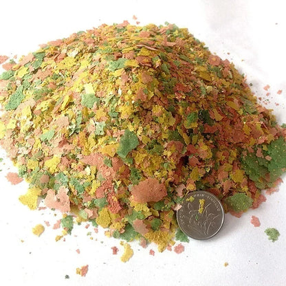 Alimento en Láminas Finas 🐠 – Para Peces Tropicales Pequeños (100 g)